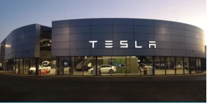 Tesla's   Prisio   Strategaeth   Curbs   Proffidioldeb
